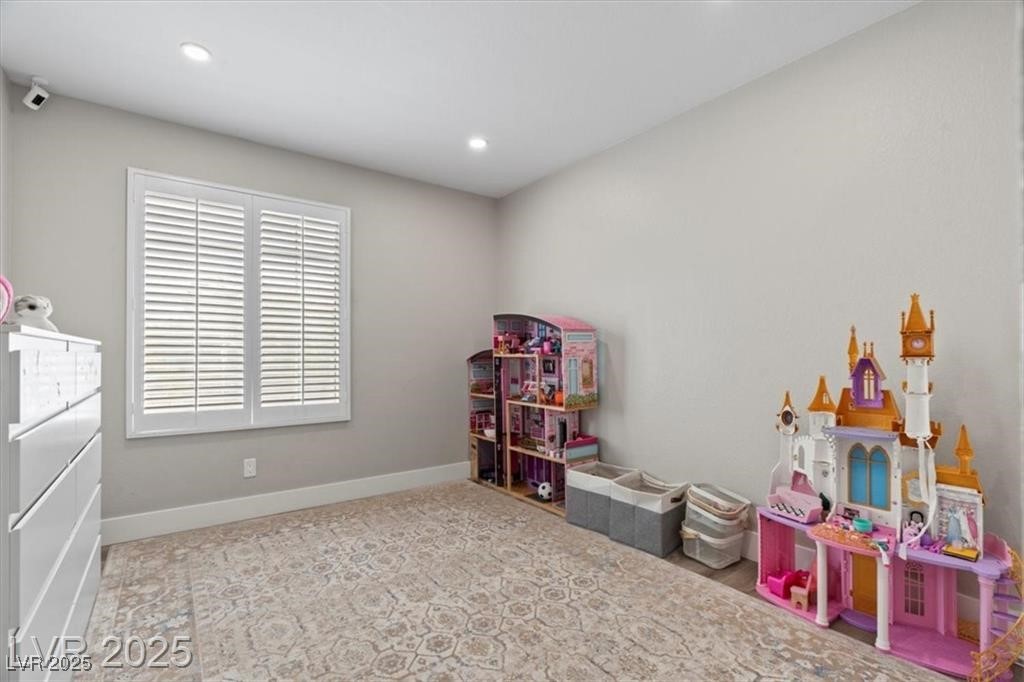 9416 Rolling Ridge Lane Las Vegas, NV 89134 - Photo 28 of 34 Game room featuring baseboards and recessed lighting