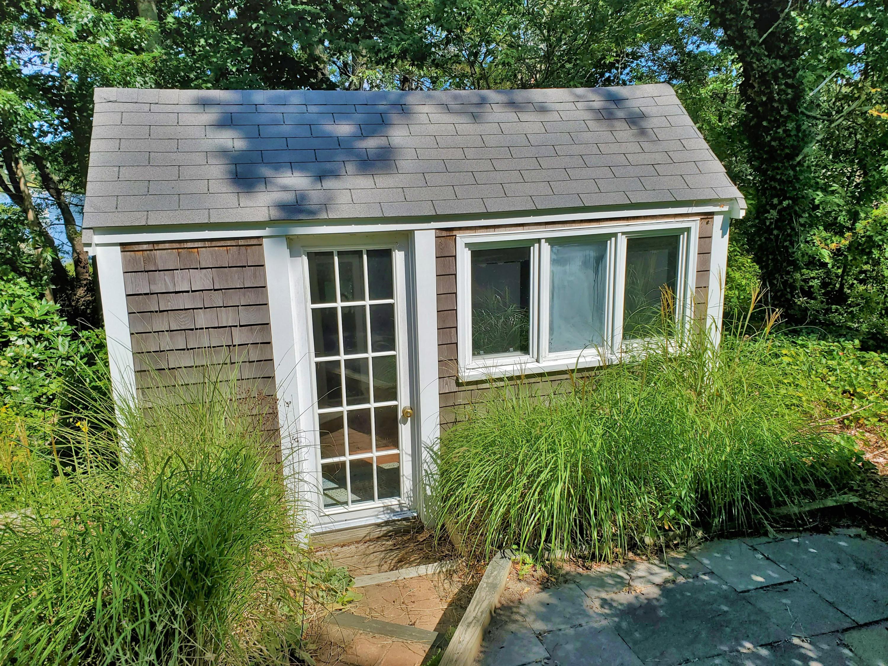 22 Jack Knife Point Road Orleans, MA 02653 - Photo 14 of 37 aerial view of a house with a yard