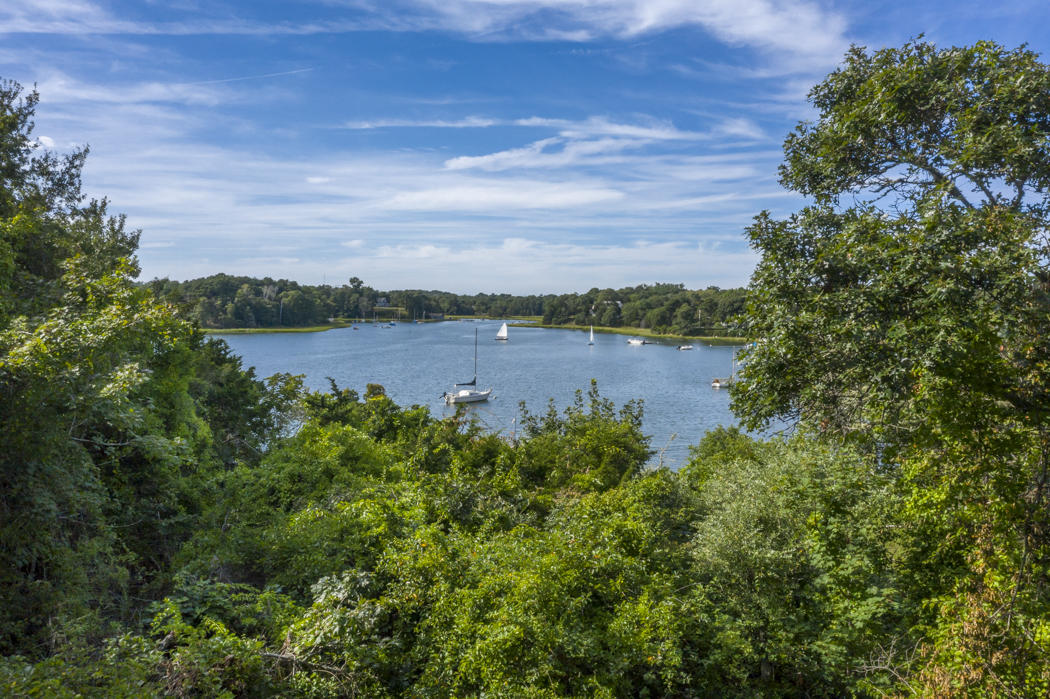22 Jack Knife Point Road Orleans, MA 02653 - Photo 24 of 37 a view of a lake with houses in the back