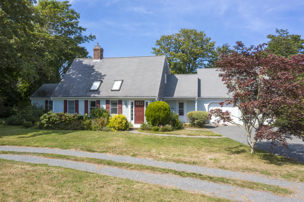 22 Jack Knife Point Road Orleans, MA 02653 - Photo 8 of 37 a front view of a house with a yard