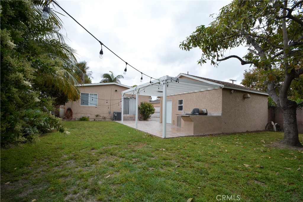 12301 Rives Avenue Downey, CA 90242 - Photo 19 of 20 a view of a yard in front of house