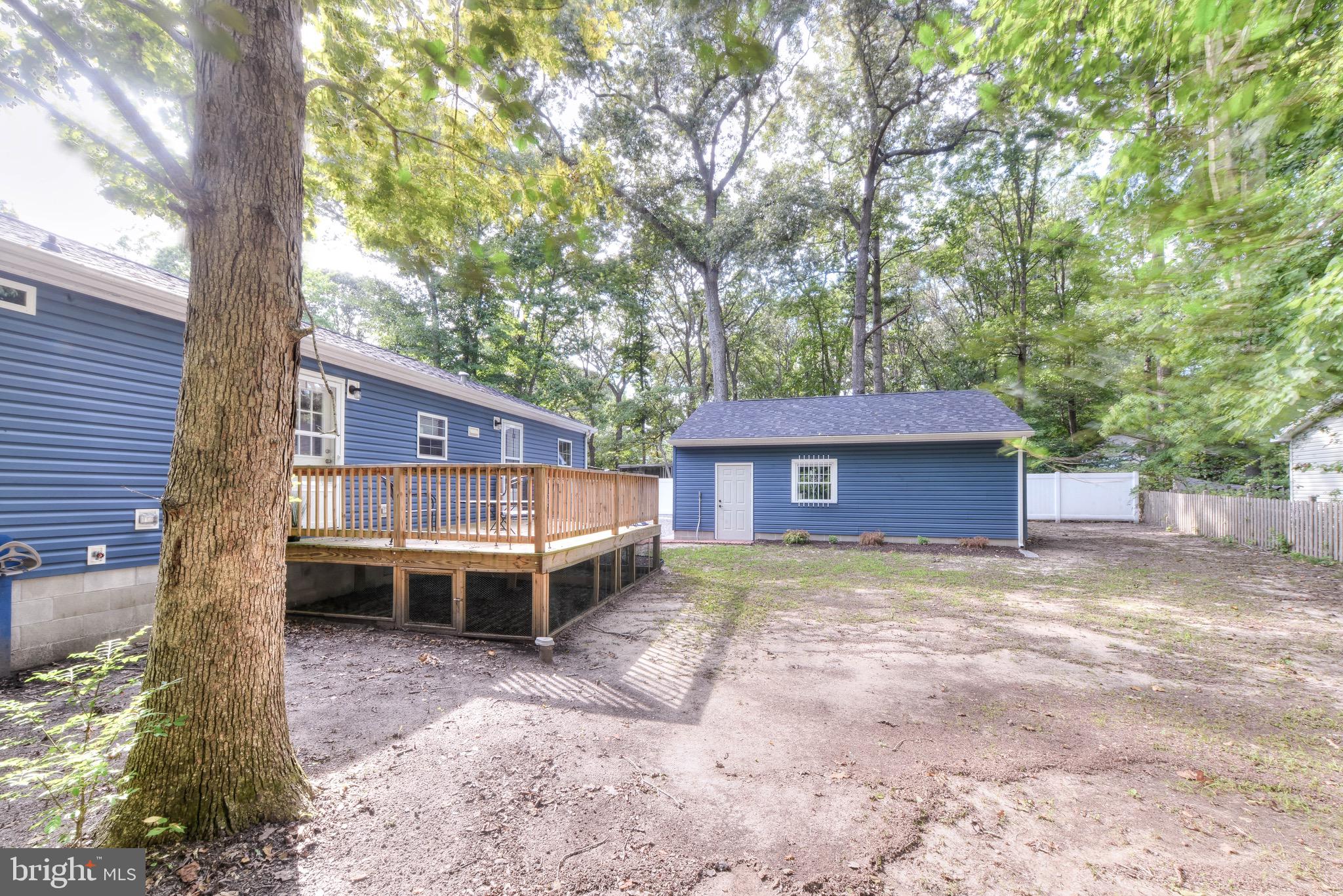22755 Camp Arrowhead Road Lewes, DE 19958 - Photo 23 of 24 Side view of back house/yard