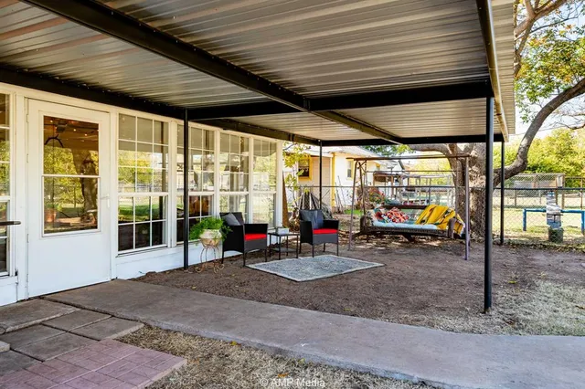 a view of a garage with chairs