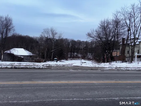 a view of street with a house