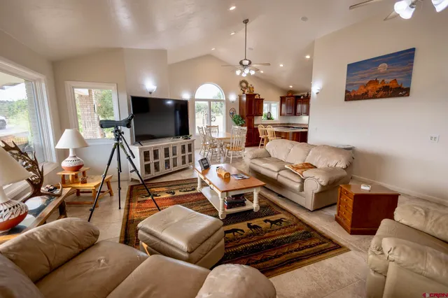 a view of a dining room with furniture