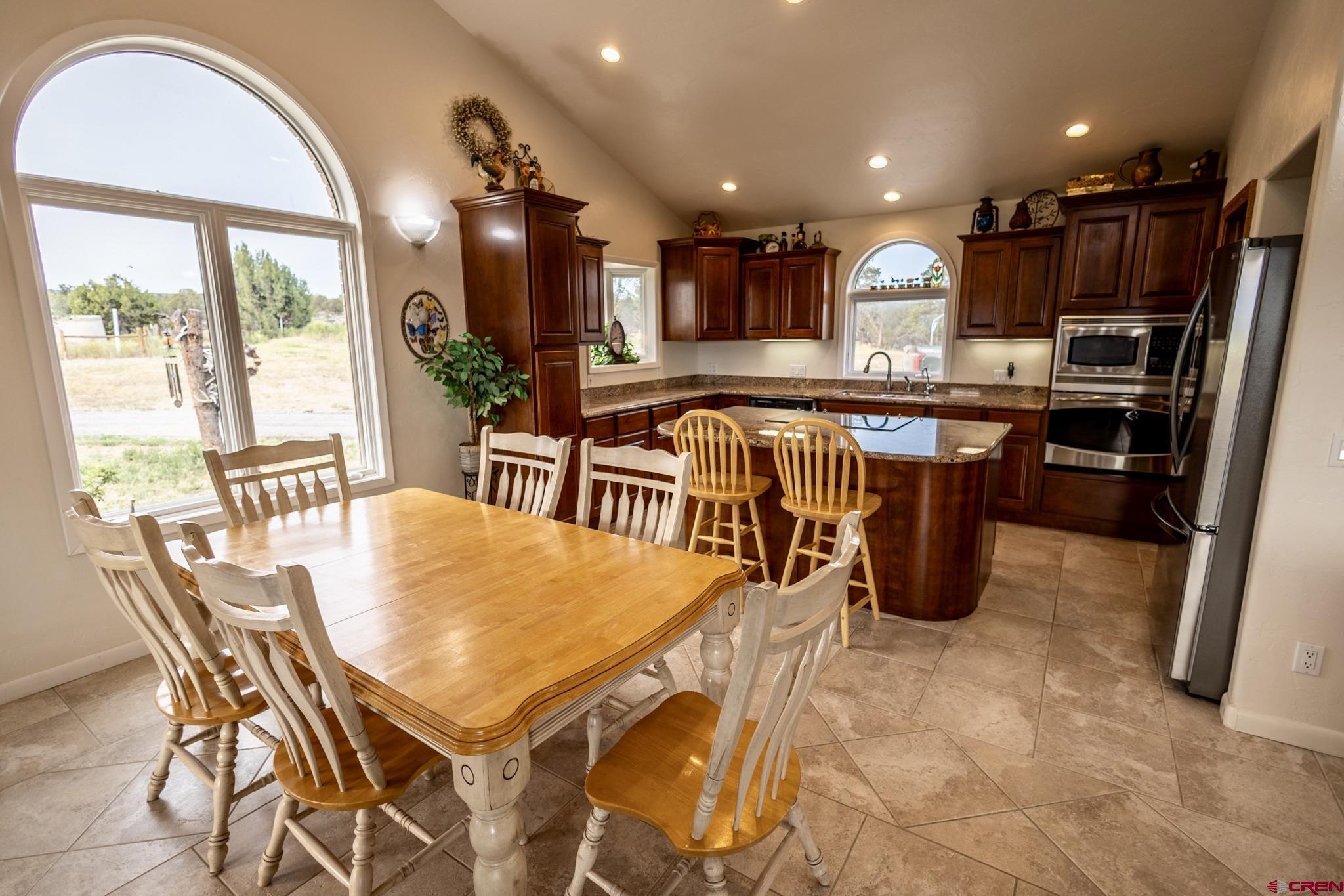 1253 3350th Road Crawford, CO 81415 - Photo 14 of 41 a view of a dining room with furniture