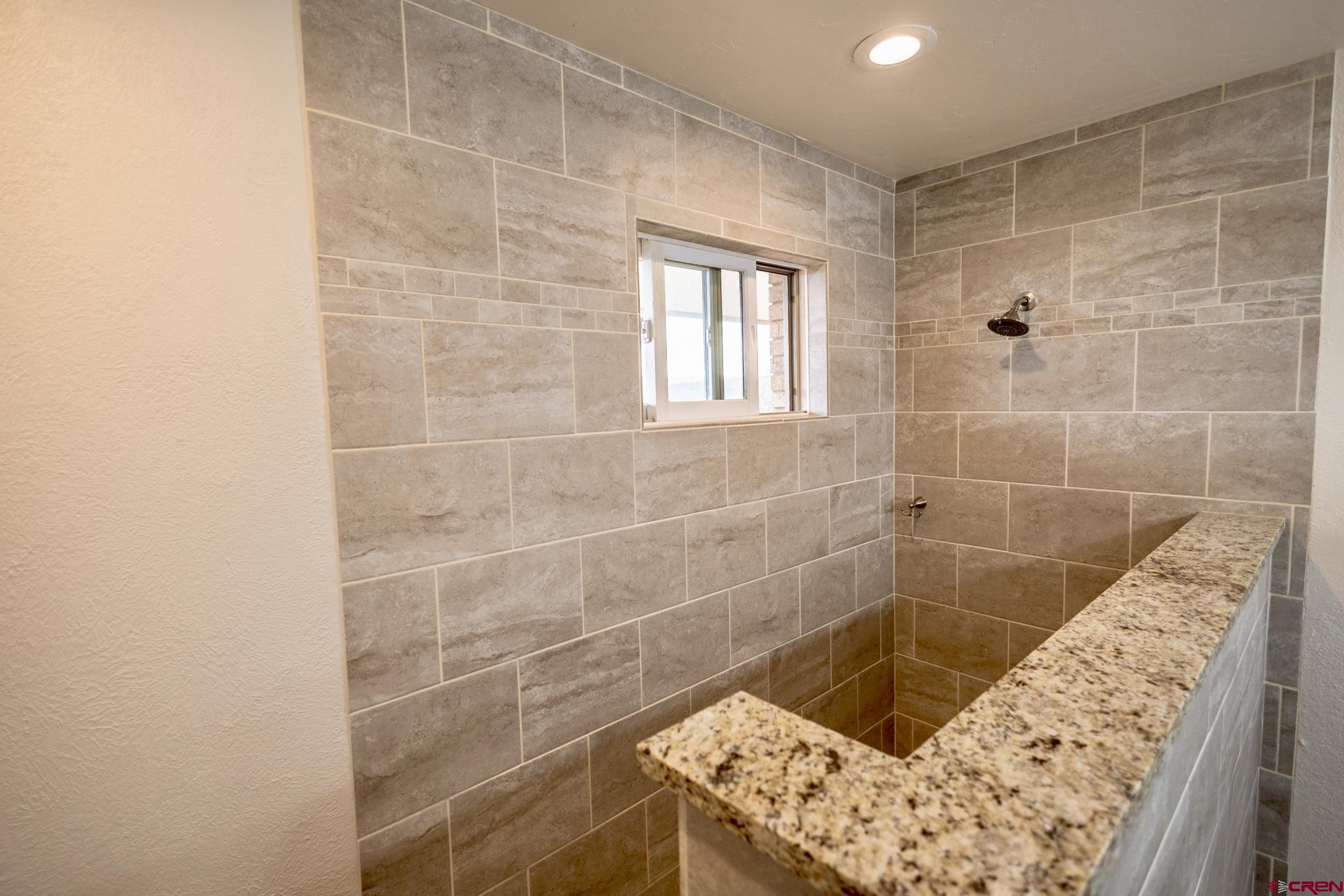 1253 3350th Road Crawford, CO 81415 - Photo 20 of 41 a bathroom with a bathtub