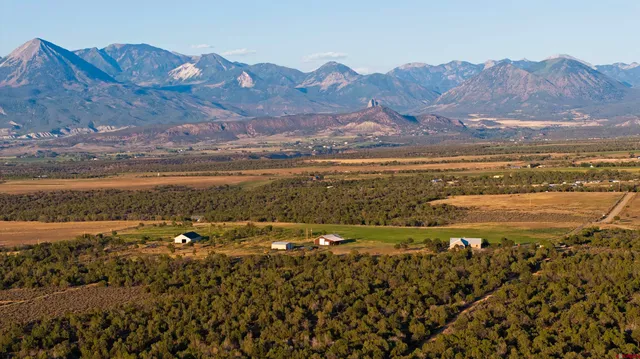 a view of an ocean and a mountain