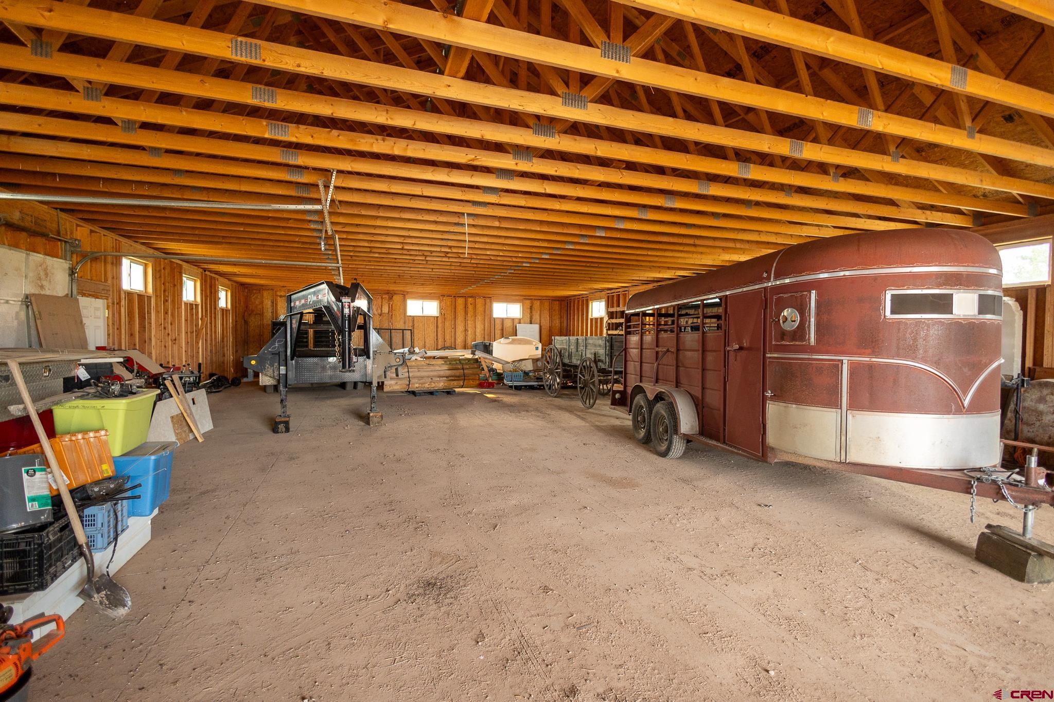 1253 3350th Road Crawford, CO 81415 - Photo 38 of 41 a view of a garage with gym equipment