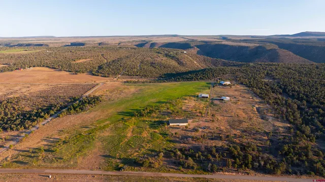 a view of a city with an ocean view