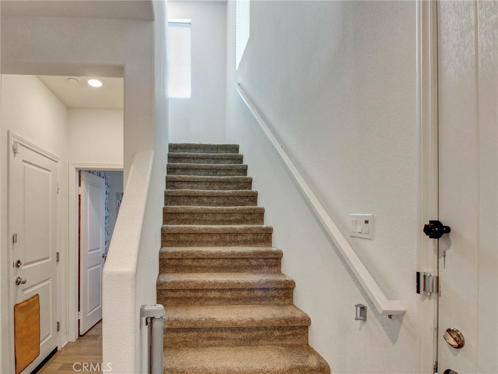 2497 Gunner Ridge Way Rialto, CA 92377 - Photo 15 of 49 a view of entryway with a front door