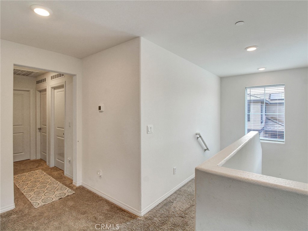 2497 Gunner Ridge Way Rialto, CA 92377 - Photo 18 of 49 a view of entryway with bathroom