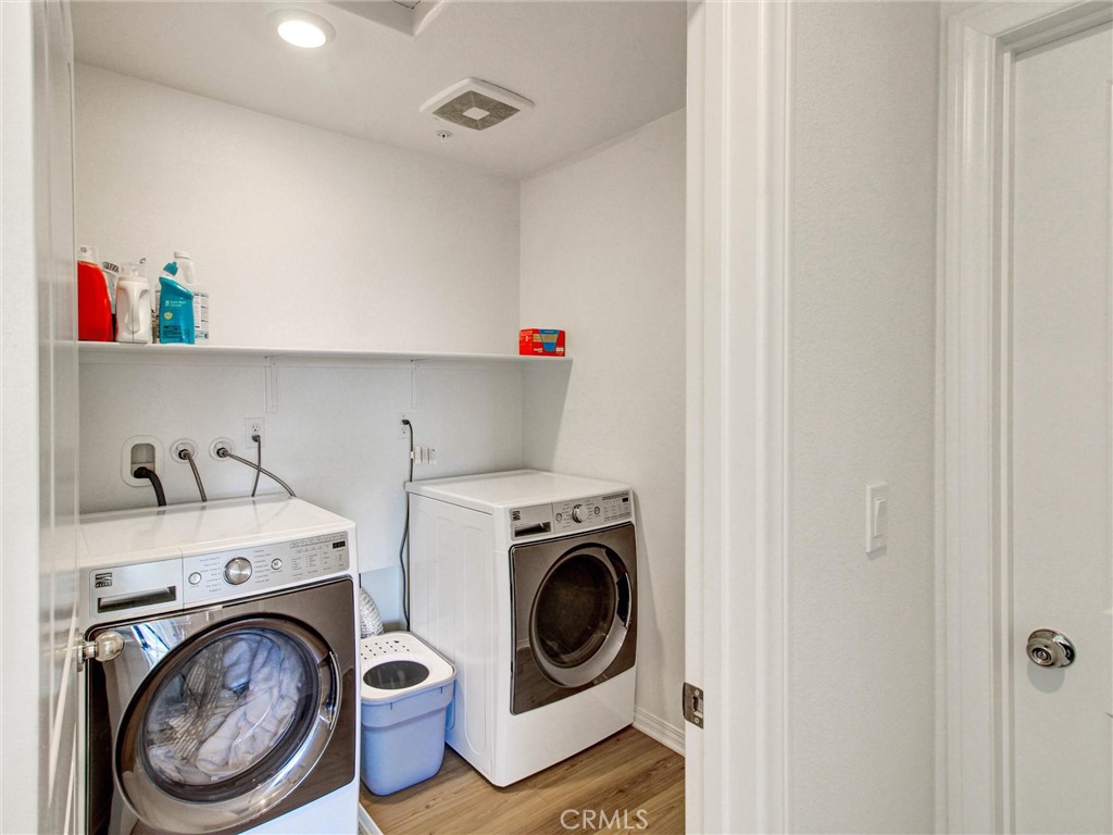 2497 Gunner Ridge Way Rialto, CA 92377 - Photo 31 of 49 a utility room with dryer and washer