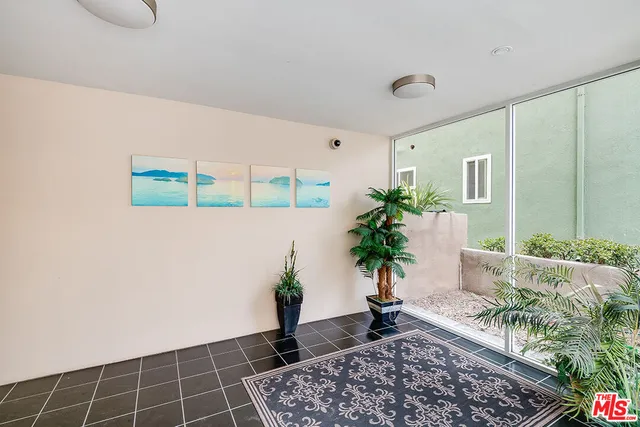 a house that has a potted plant in it