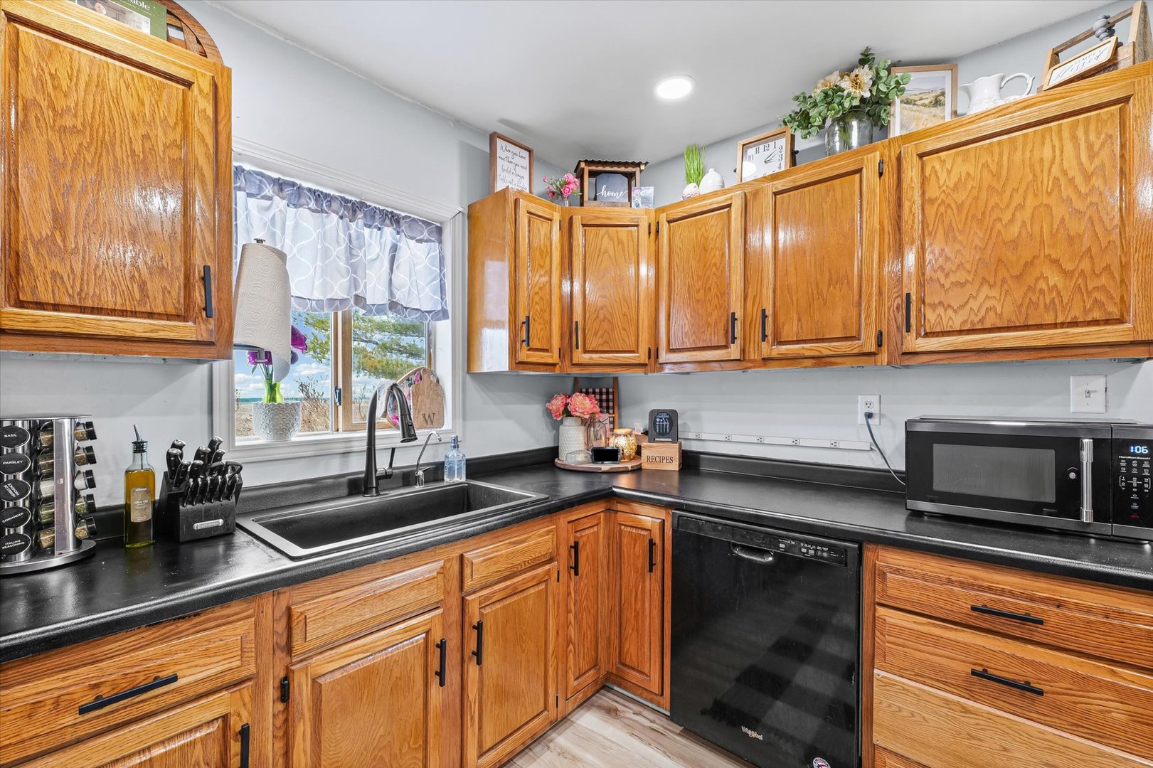 314 North 200 East Road Loda, IL 60948 - Photo 11 of 28 a kitchen with stainless steel appliances granite countertop a sink a stove and cabinets