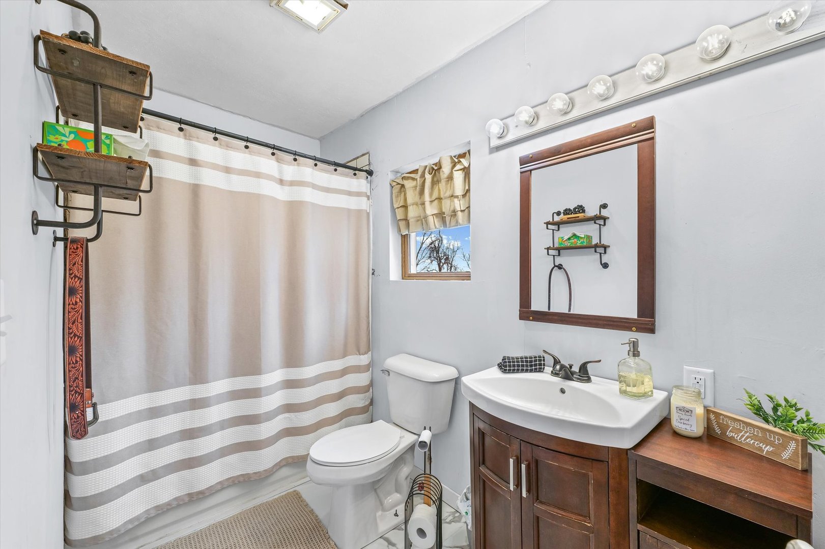 314 North 200 East Road Loda, IL 60948 - Photo 16 of 28 a bathroom with a sink toilet and shower