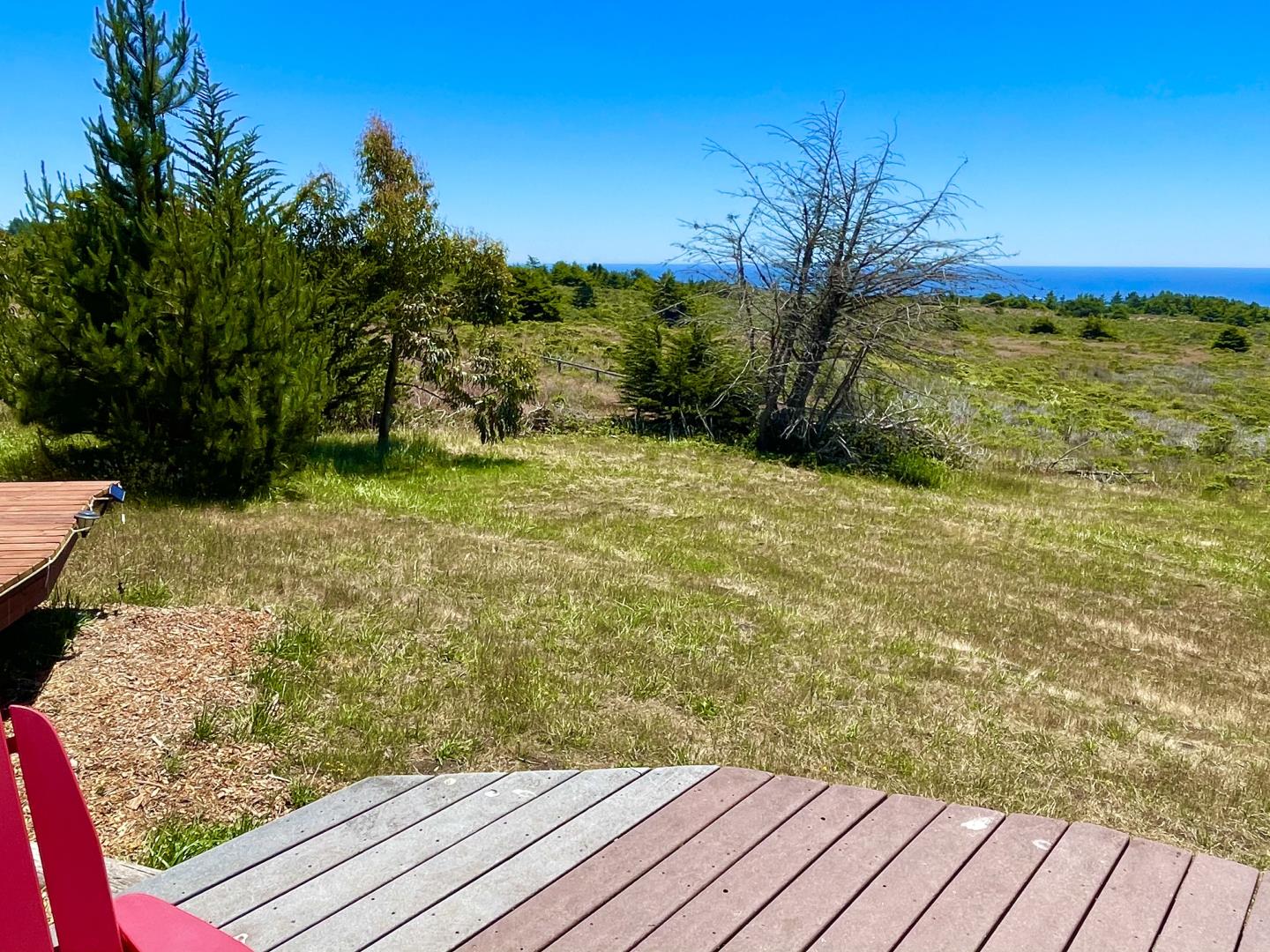 Pigeon Point Road Pescadero, CA 94060 - Photo 17 of 31 a view of a yard with wooden floor