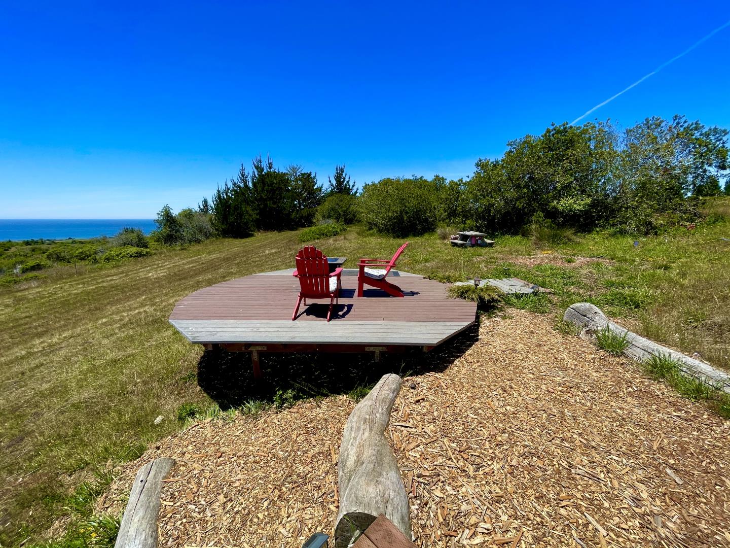 Pigeon Point Road Pescadero, CA 94060 - Photo 18 of 31 a view of a lake with a table and chairs