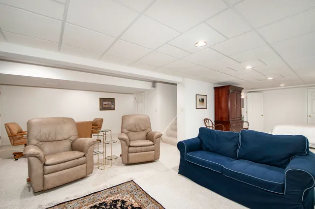 a living room with furniture and a couch