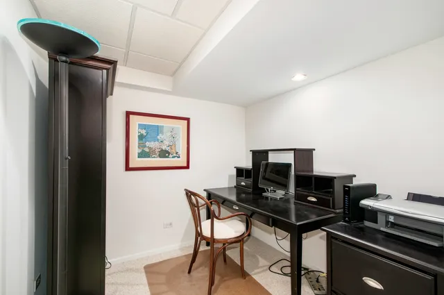 a view of a workspace with furniture