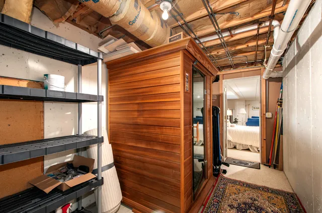 a view of hallway with wooden floor