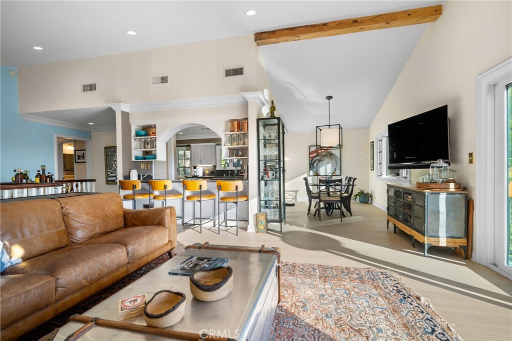913 Sherlock Drive Burbank, CA 91501 - Photo 16 of 53 a living room with furniture and a flat screen tv