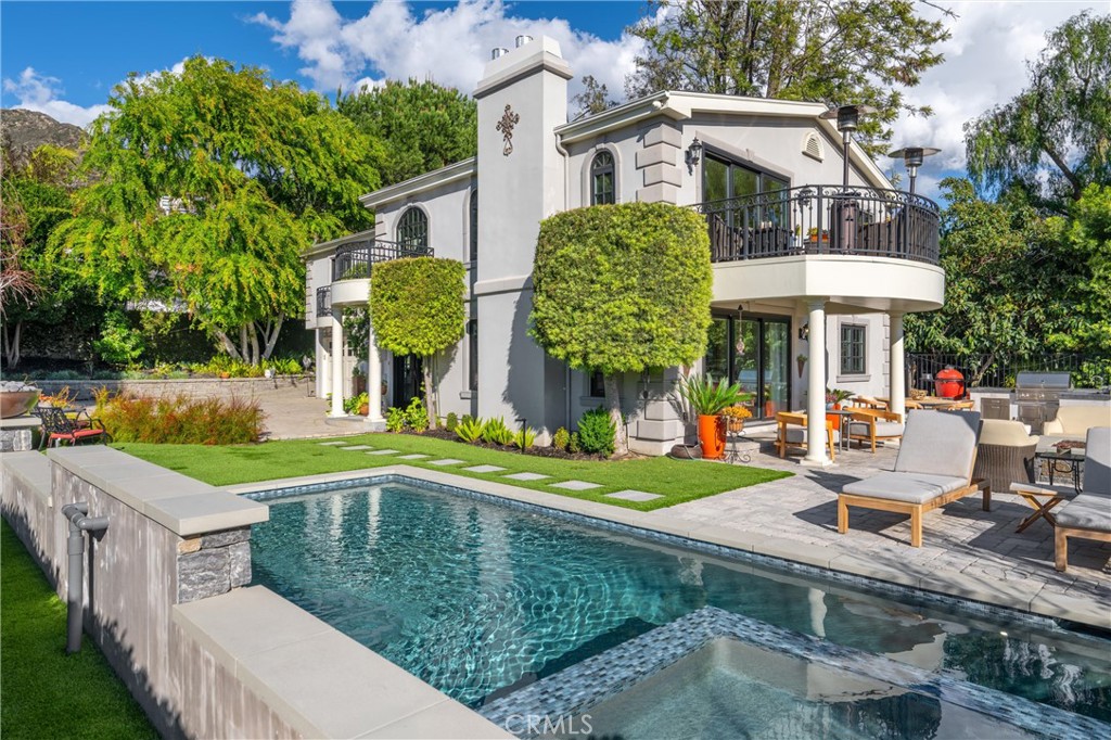 913 Sherlock Drive Burbank, CA 91501 - Photo 5 of 53 a view of a house with backyard and sitting area