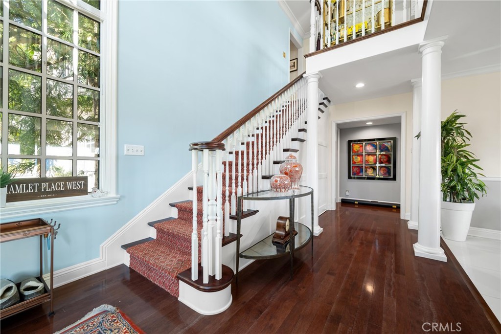 913 Sherlock Drive Burbank, CA 91501 - Photo 7 of 53 a view of a livingroom with wooden floor and stairs