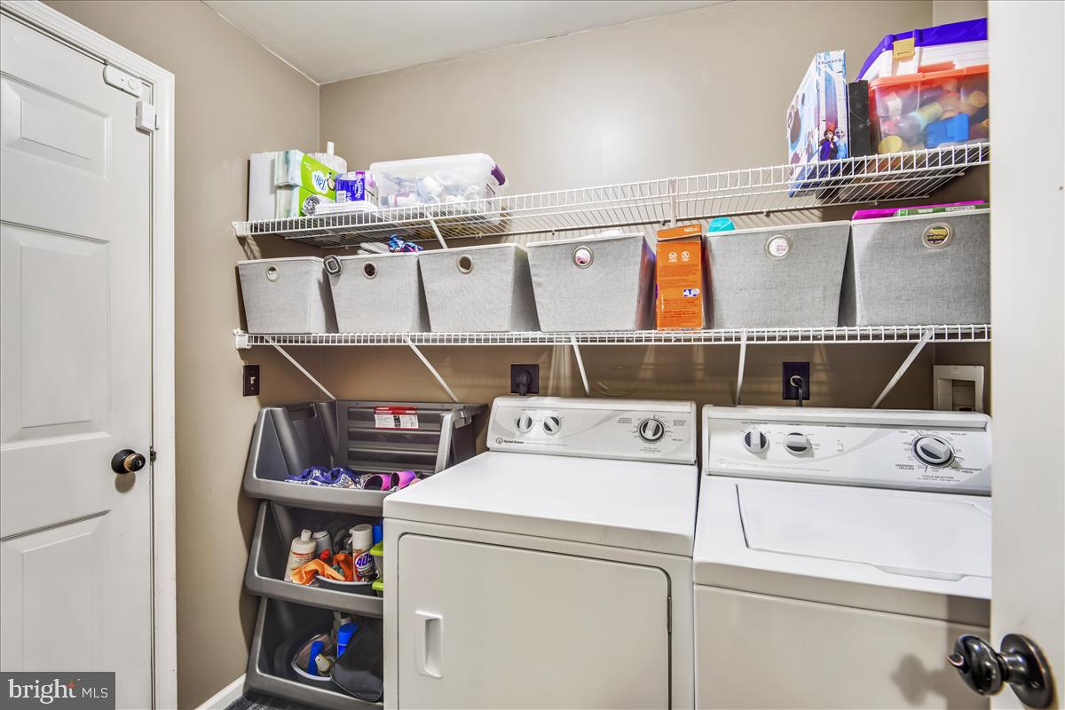 1407 Bush Road Severn, MD 21144 - Photo 45 of 56 Utility Room with Washer and Dryer