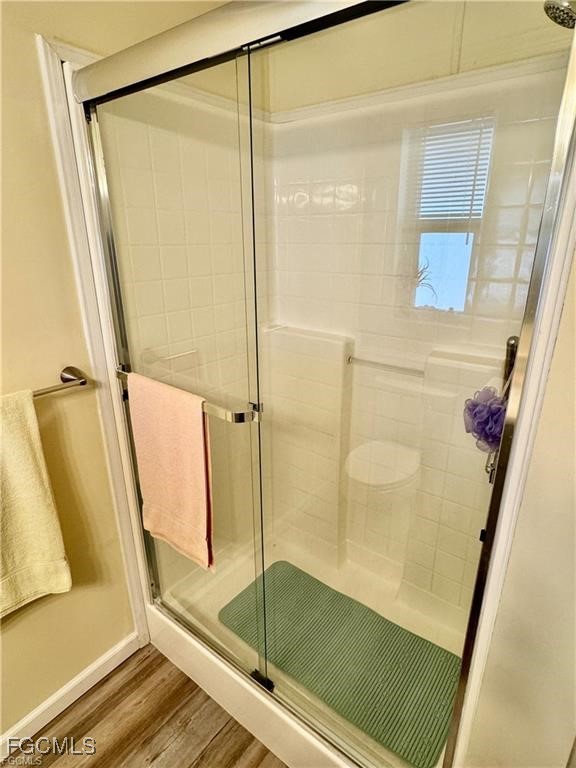 19681 Summerlin Road, Unit 217 Fort Myers, FL 33908 - Photo 14 of 24 a bathroom with a glass door shower and vanity