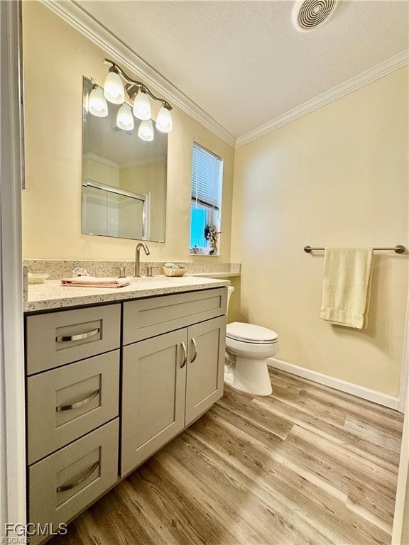 19681 Summerlin Road, Unit 217 Fort Myers, FL 33908 - Photo 15 of 24 a bathroom with a double vanity sink and a mirror