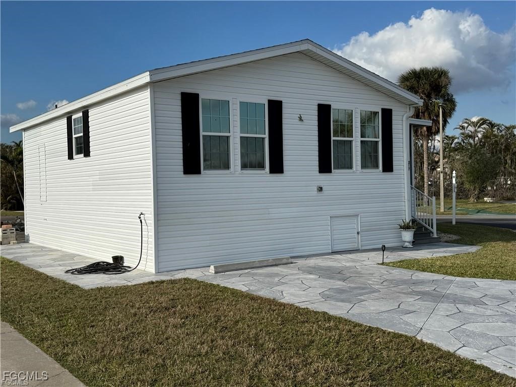 19681 Summerlin Road, Unit 217 Fort Myers, FL 33908 - Photo 22 of 24 a view of backyard of house
