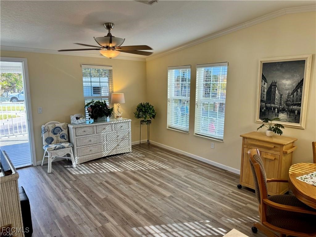 19681 Summerlin Road, Unit 217 Fort Myers, FL 33908 - Photo 5 of 24 a living room with furniture and a window