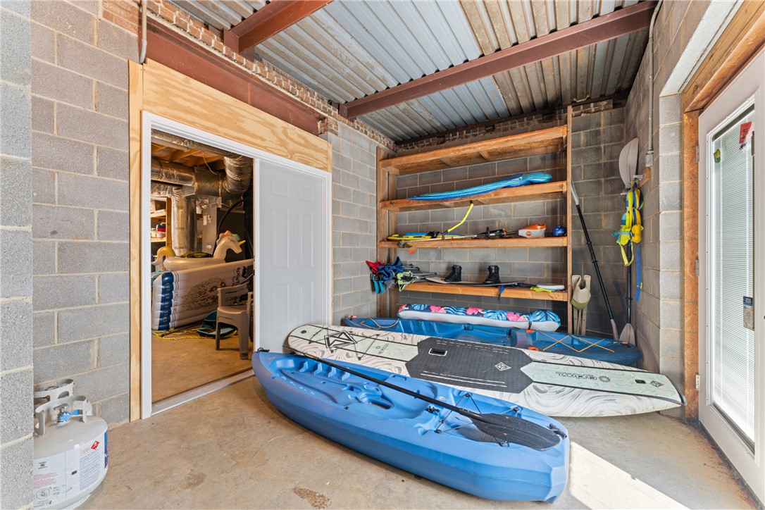 622 Jackson Road Anderson, SC 29626 - Photo 42 of 50 Secure storage area featuring sturdy block walls and convenient shelving for all your outdoor gear.