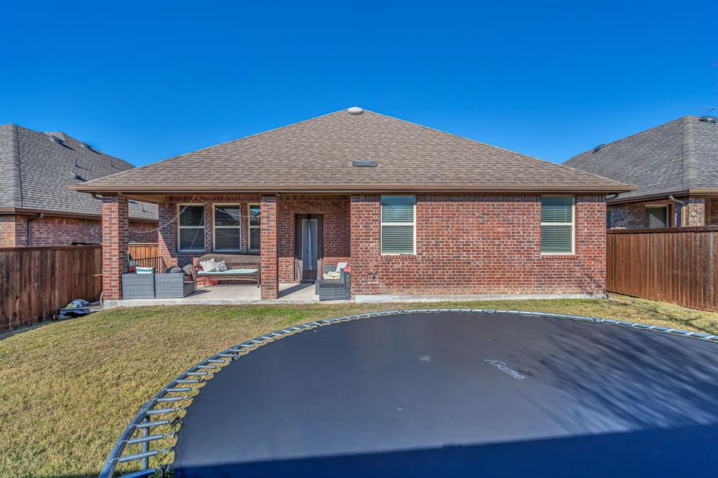1009 Azure Lane Celina, TX 75009 - Photo 5 of 20 a front view of a house with swimming pool