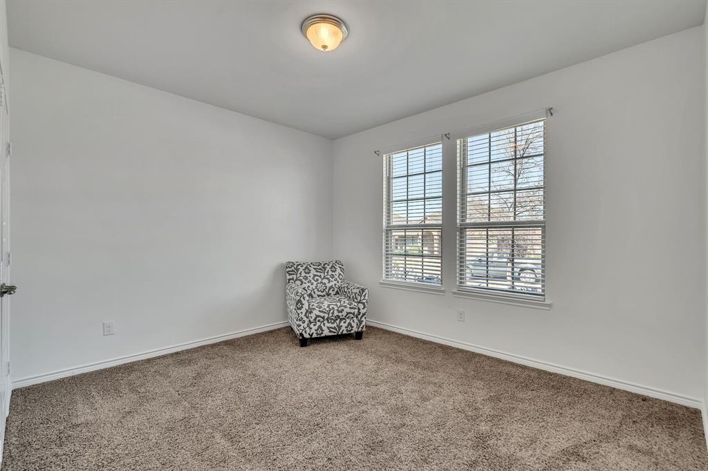 1009 Azure Lane Celina, TX 75009 - Photo 7 of 20 an empty room with a window