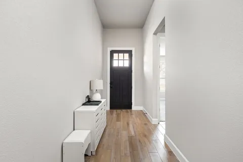 a view of a livingroom with wooden floor