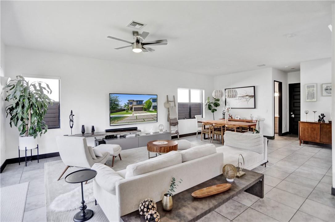 16001 Southwest 136 Way Miami, FL 33196 - Photo 24 of 66 a living room with furniture and a large window