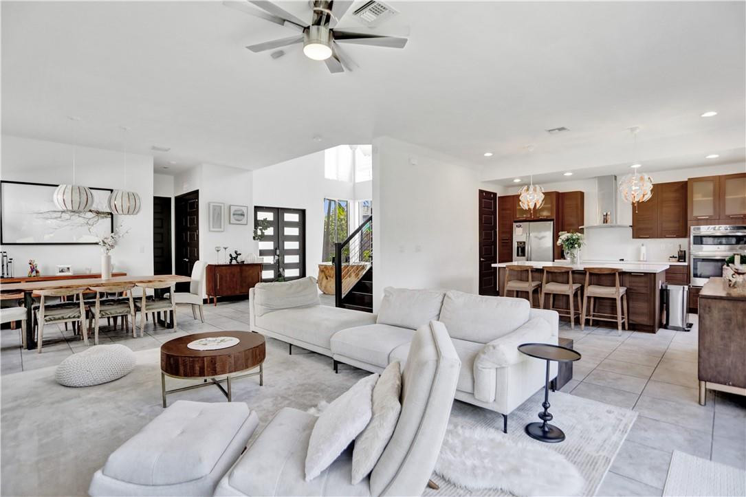 16001 Southwest 136 Way Miami, FL 33196 - Photo 29 of 66 a living room with furniture and kitchen view