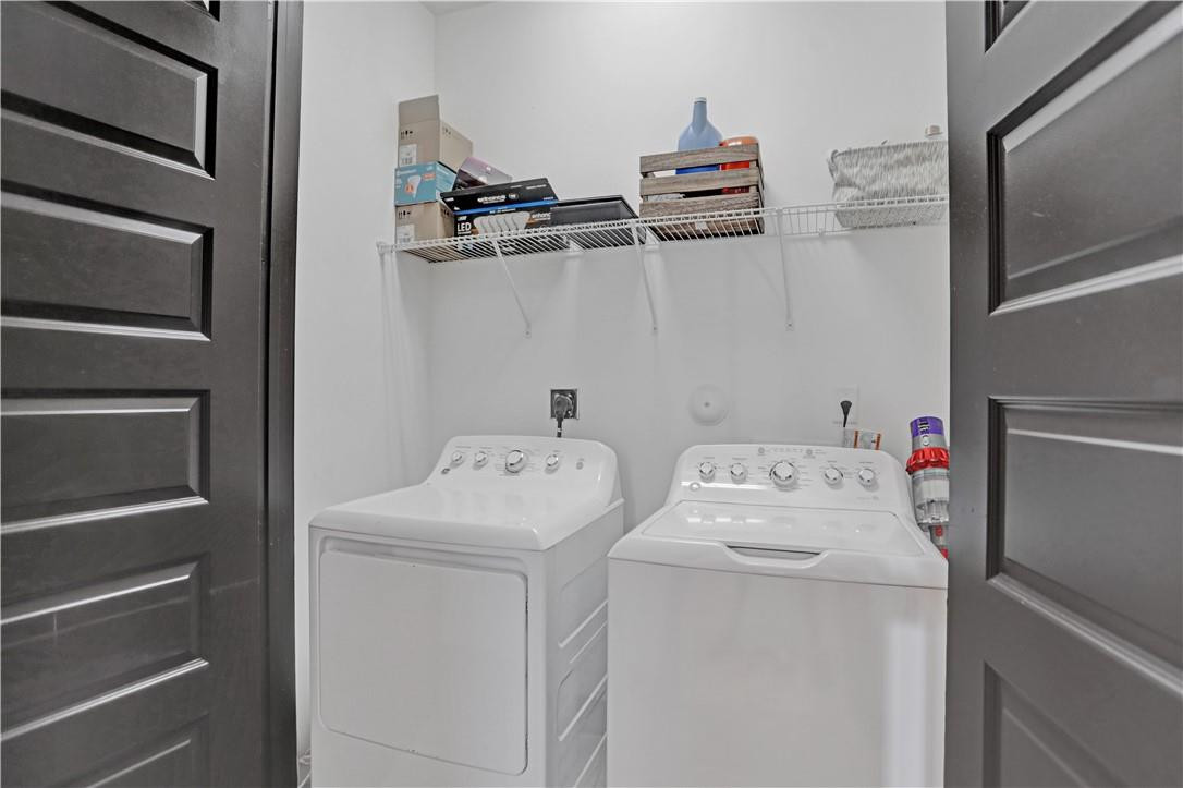 16001 Southwest 136 Way Miami, FL 33196 - Photo 34 of 66 a utility room with dryer and washer