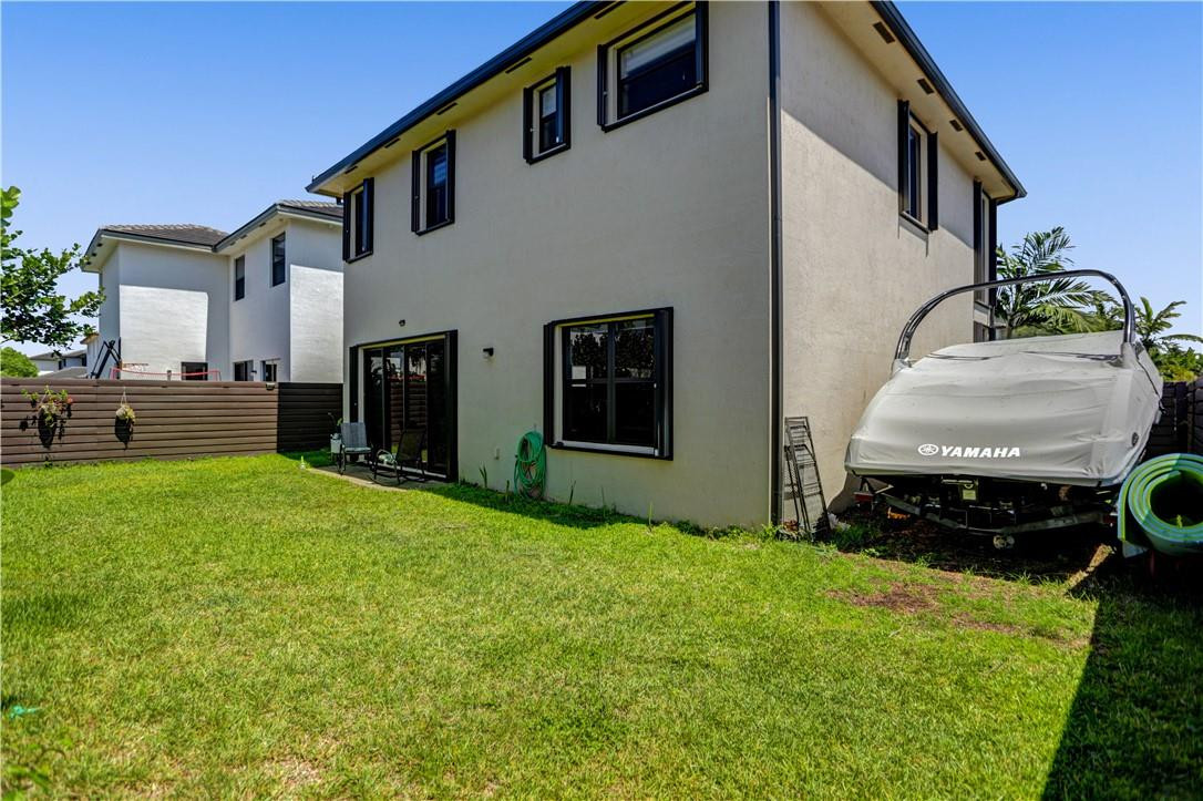 16001 Southwest 136 Way Miami, FL 33196 - Photo 37 of 66 a house view with a garden space