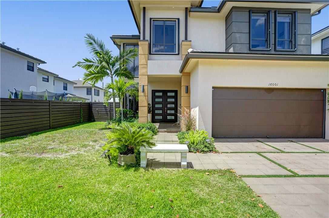 16001 Southwest 136 Way Miami, FL 33196 - Photo 5 of 66 Accordion Shutters throughout!