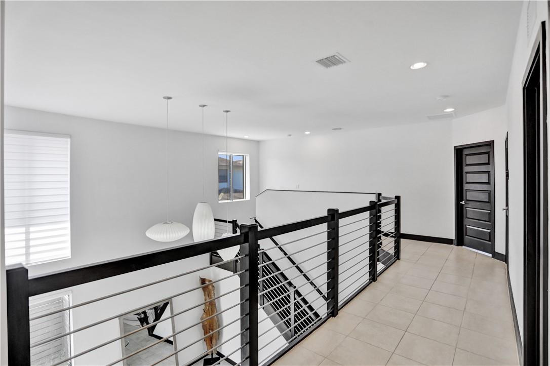 16001 Southwest 136 Way Miami, FL 33196 - Photo 52 of 66 a view of a hallway with seating area