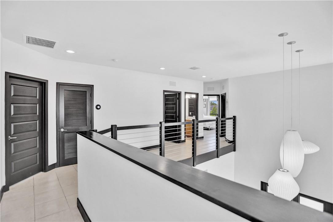 16001 Southwest 136 Way Miami, FL 33196 - Photo 54 of 66 a kitchen with stainless steel appliances granite countertop a sink and a refrigerator