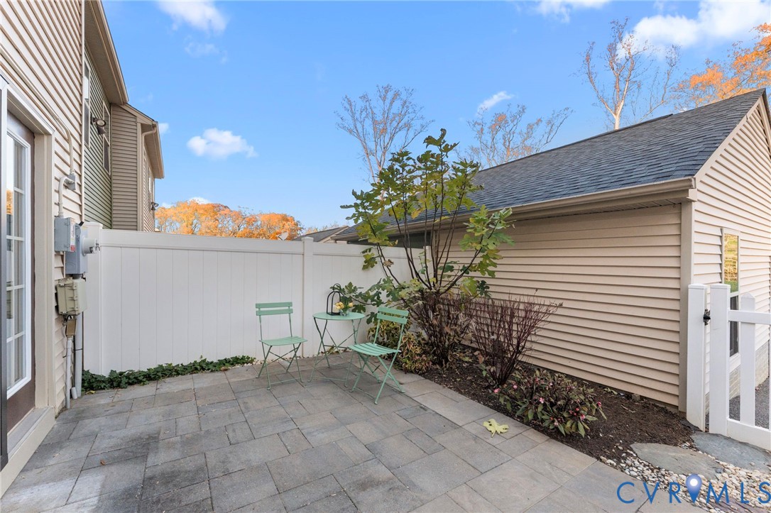 5504 Riverside Heights Way Richmond, VA 23225 - Photo 27 of 29 a potted plant sitting in front of a house