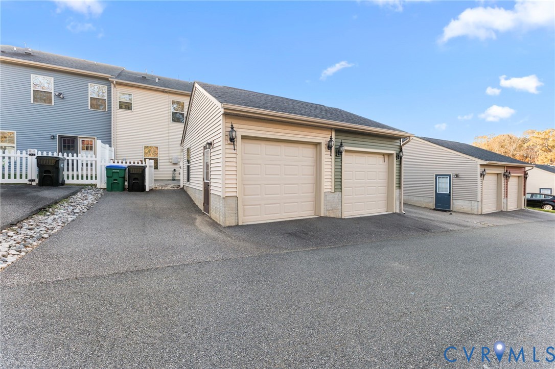 5504 Riverside Heights Way Richmond, VA 23225 - Photo 29 of 29 a view of a house with garage