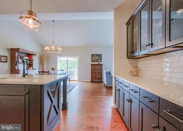 a view of a kitchen and sink