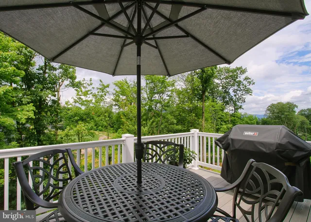 a view of outdoor sitting area with furniture