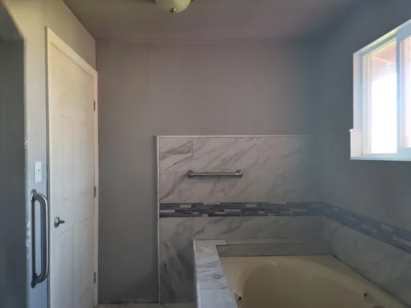 a bathroom with a bathtub