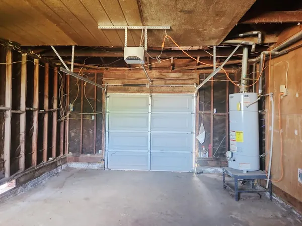 a view of a room with wooden walls